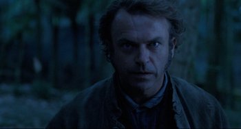 Movie still from “The Piano” (1993), directed by Jane Campion – A person wearing a jacket; Close Up shot, Over the shoulder angle