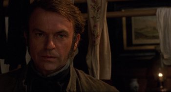 Movie still from “The Piano” (1993), directed by Jane Campion – A person with a beard; Close Up shot, Over the shoulder angle