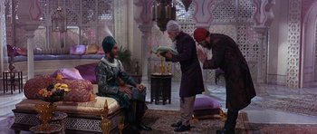 Movie still from “The Pink Panther” (1963), directed by Blake Edwards – A group of men standing in a room; Wide shot, High angle