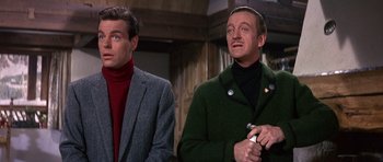 Movie still from “The Pink Panther” (1963), directed by Blake Edwards – Two men are standing next to each other in a room; Close Up shot, Low angle