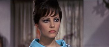 Movie still from “The Pink Panther” (1963), directed by Blake Edwards – A person wearing a blue shirt; Close Up shot, Low angle