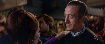 Movie still from “The Pink Panther” (1963), directed by Blake Edwards – A man is touching a woman's face with his hand; Close Up shot, Over the shoulder angle