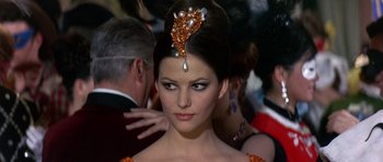Movie still from “The Pink Panther” (1963), directed by Blake Edwards – A person wearing a dress; Close Up shot, Low angle