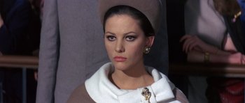 Movie still from “The Pink Panther” (1963), directed by Blake Edwards – A person wearing a hat; Close Up shot, Low angle