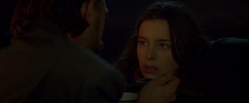 Movie still from “The Postman” (1997), directed by Kevin Costner – A man and a woman looking at one another; Close Up shot, Over the shoulder angle