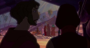 Movie still from “The Prince of Egypt” (1998), directed by Brenda Chapman – A group of people standing in front of a mountain; Medium shot, Over the shoulder angle