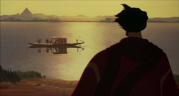 Movie still from “The Prince of Egypt” (1998), directed by Brenda Chapman – A man sitting in front of a body of water; Extreme Wide shot, Low angle