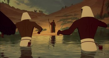 Movie still from “The Prince of Egypt” (1998), directed by Brenda Chapman – Two men are standing in a body of water; Wide shot, High angle
