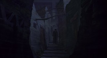Movie still from “The Prince of Egypt” (1998), directed by Brenda Chapman – A man standing in a dark alleyway with trees; Extreme Wide shot, Low angle