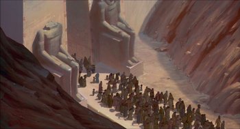 Movie still from “The Prince of Egypt” (1998), directed by Brenda Chapman – A group of people standing next to each other near statues; Extreme Wide shot, High angle