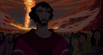 Movie still from “The Prince of Egypt” (1998), directed by Brenda Chapman – A man with a beard is standing in front of a crowd of onlookers; Close Up shot, Over the shoulder angle