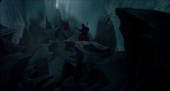 Movie still from “The Prince of Egypt” (1998), directed by Brenda Chapman – A man with a sword standing on a mountain; Extreme Wide shot, High angle