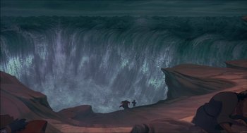 Movie still from “The Prince of Egypt” (1998), directed by Brenda Chapman – Two people standing on a cliff looking at a large waterfall; Extreme Wide shot, High angle