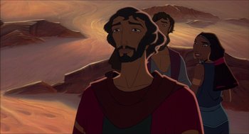 Movie still from “The Prince of Egypt” (1998), directed by Brenda Chapman – A painting of a man with a long beard and a man with a long beard; Close Up shot, Over the shoulder angle