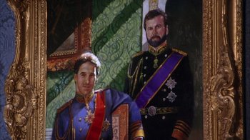 Movie still from “The Princess Diaries 2: Royal Engagement” (2004), directed by Garry Marshall – A painting of a man and a man in a suit; Medium shot, Low angle