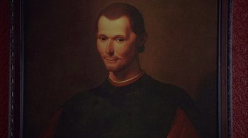 Movie still from “The Princess Diaries 2: Royal Engagement” (2004), directed by Garry Marshall – A painting of a man in a black shirt and a red shirt; Close Up shot, High angle