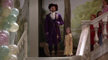 Movie still from “The Princess Diaries 2: Royal Engagement” (2004), directed by Garry Marshall – A man and a little girl standing on a staircase; Wide shot, Low angle