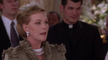 Movie still from “The Princess Diaries 2: Royal Engagement” (2004), directed by Garry Marshall – A person wearing a tiara; Close Up shot, Over the shoulder angle