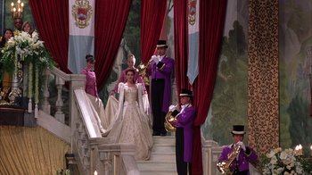 Movie still from “The Princess Diaries 2: Royal Engagement” (2004), directed by Garry Marshall – A group of men and a woman dressed as cinderella and prince charming; Wide shot, High angle