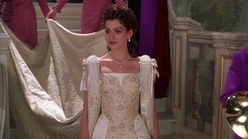 Movie still from “The Princess Diaries 2: Royal Engagement” (2004), directed by Garry Marshall – A woman in a white dress standing in front of a mirror; Medium shot, Over the shoulder angle