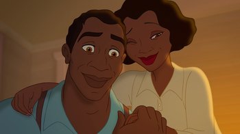Movie still from “The Princess and the Frog” (2009), directed by Ron Clements – A man and a woman smiling for the camera; Close Up shot, Low angle