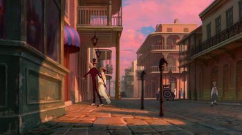 Movie still from “The Princess and the Frog” (2009), directed by Ron Clements – An artist's rendering of a street scene with a man and a woman; Extreme Wide shot, Low angle