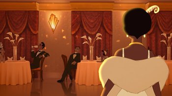 Movie still from “The Princess and the Frog” (2009), directed by Ron Clements – An illustration of a couple sitting at a dinner table; Wide shot, Over the shoulder angle