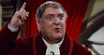 Movie still from “The Producers” (1967), directed by Mel Brooks – An older man with a surprised look on his face; Close Up shot, High angle