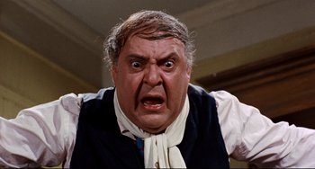 Movie still from “The Producers” (1967), directed by Mel Brooks – An older man with a surprised look on his face; Close Up shot, High angle