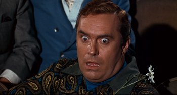 Movie still from “The Producers” (1967), directed by Mel Brooks – A person with a surprised look on his face; Close Up shot, Low angle