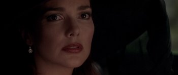 Movie still from “The Punisher” (2004), directed by Jonathan Hensleigh – A woman's face in the dark; Close Up shot, Over the shoulder angle