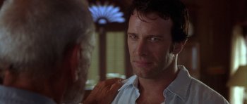 Movie still from “The Punisher” (2004), directed by Jonathan Hensleigh – A person with his hand on his shoulder; Close Up shot, Over the shoulder angle