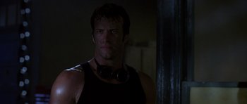 Movie still from “The Punisher” (2004), directed by Jonathan Hensleigh – A person wearing a tank top and goggles; Close Up shot, Low angle