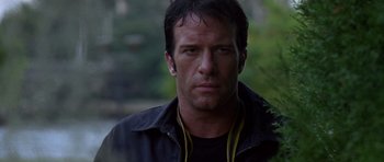 Movie still from “The Punisher” (2004), directed by Jonathan Hensleigh – A person wearing a black jacket; Close Up shot, Low angle