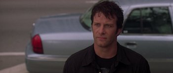 Movie still from “The Punisher” (2004), directed by Jonathan Hensleigh – A person wearing a black shirt; Close Up shot, Low angle