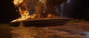 Movie still from “The Punisher” (2004), directed by Jonathan Hensleigh – A boat on fire in the middle of the night; Extreme Wide shot, High angle