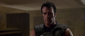 Movie still from “The Punisher” (2004), directed by Jonathan Hensleigh – A person wearing a shirt; Close Up shot, Low angle