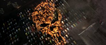 Movie still from “The Punisher” (2004), directed by Jonathan Hensleigh – An aerial view of a parking lot filled with lots of cars; Wide shot, Overhead angle