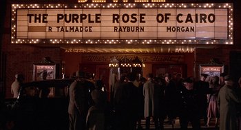 Movie still from “The Purple Rose of Cairo” (1985), directed by Woody Allen – A crowd of people standing in front of a theater; Wide shot, Low angle