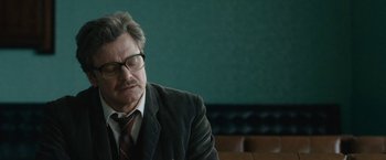 Movie still from “The Railway Man” (2013), directed by Jonathan Teplitzky – An older man wearing a suit and tie; Close Up shot, Low angle