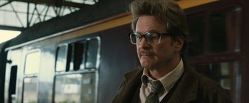 Movie still from “The Railway Man” (2013), directed by Jonathan Teplitzky – A person wearing a suit and tie; Close Up shot, Low angle