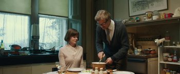 Movie still from “The Railway Man” (2013), directed by Jonathan Teplitzky – A man and a woman at a table with a bowl of food; Medium shot, Over the shoulder angle