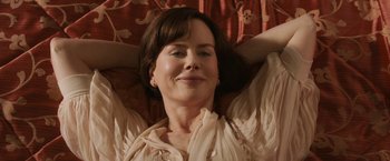 Movie still from “The Railway Man” (2013), directed by Jonathan Teplitzky – A person laying on a bed; Close Up shot, High angle