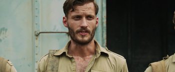 Movie still from “The Railway Man” (2013), directed by Jonathan Teplitzky – A person wearing a shirt; Close Up shot, Over the shoulder angle