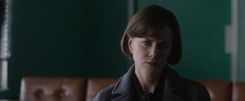 Movie still from “The Railway Man” (2013), directed by Jonathan Teplitzky – A person with short hair; Close Up shot, Over the shoulder angle