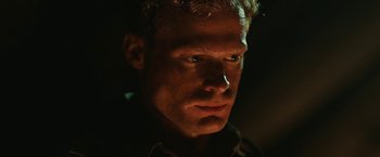 Movie still from “The Railway Man” (2013), directed by Jonathan Teplitzky – A person looking at the camera; Close Up shot, Low angle