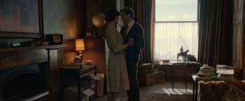 Movie still from “The Railway Man” (2013), directed by Jonathan Teplitzky – A man and a woman dancing in a living room; Wide shot, Low angle