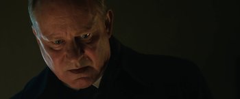 Movie still from “The Railway Man” (2013), directed by Jonathan Teplitzky – A person wearing a suit and tie; Close Up shot, Low angle