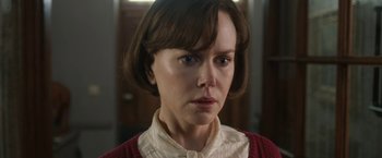 Movie still from “The Railway Man” (2013), directed by Jonathan Teplitzky – A person with short brown hair; Close Up shot, Over the shoulder angle