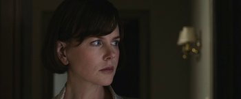 Movie still from “The Railway Man” (2013), directed by Jonathan Teplitzky – A person looking to her left; Close Up shot, Low angle